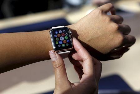 A customer looks over an Apple Watch in Palo Alto